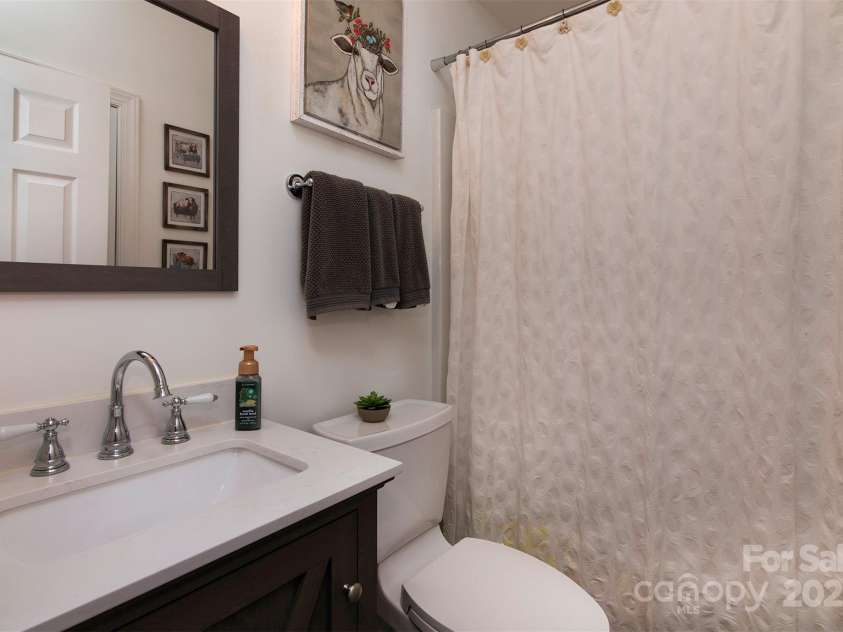 212 Horn Tassel Court, Indian Trail, NC 28079.  MLS# CAR4244678, YatesRealty ID 11066. Full bath on the main level is right off bedroom 2 - perfect for guest that don't do stairs.