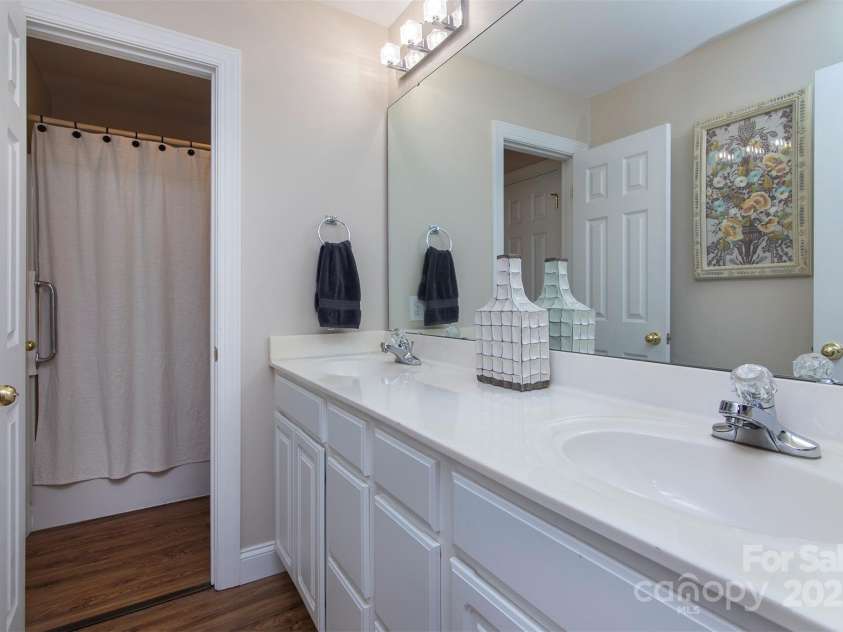 212 Horn Tassel Court, Indian Trail, NC 28079.  MLS# CAR4244678, YatesRealty ID 11066. Jack and Jill bathroom upstairs - 2 separate vanity spaces and shared shower/water closet.