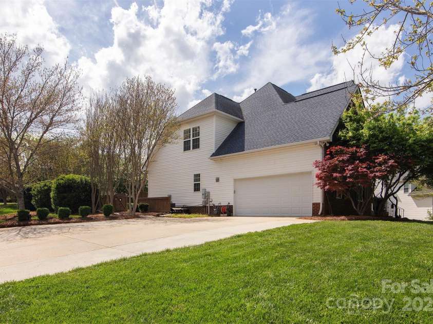 212 Horn Tassel Court, Indian Trail, NC 28079.  MLS# CAR4244678, YatesRealty ID 11066. Lots of parking in the garage, oversized driveway / extra parking pad.