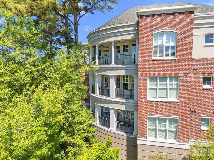 5425 Closeburn Road, Charlotte, NC 28210.  MLS# CAR4366605, YatesRealty ID 11067. 2nd floor end unit with wrap around covered porch
