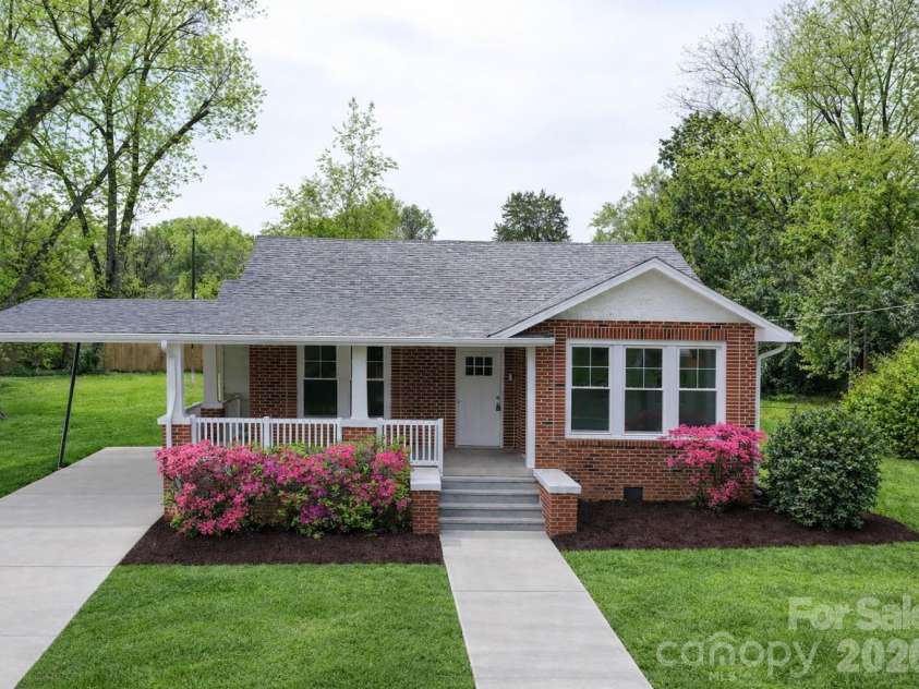 307 Washington Avenue, Bessemer City, NC 28016.  MLS# CAR4365960, YatesRealty ID 11071. Virtually enhanced for brighter grass and walkways.