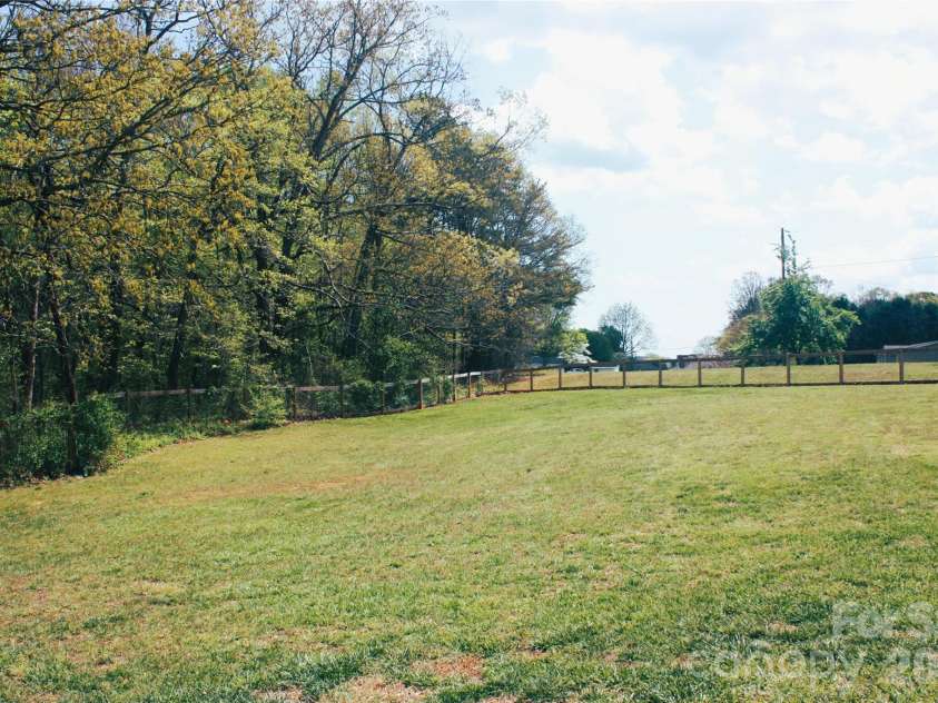 191 Celeste Eufola Road, Statesville, NC 28677.  MLS# CAR4365990, YatesRealty ID 11072. Back yard