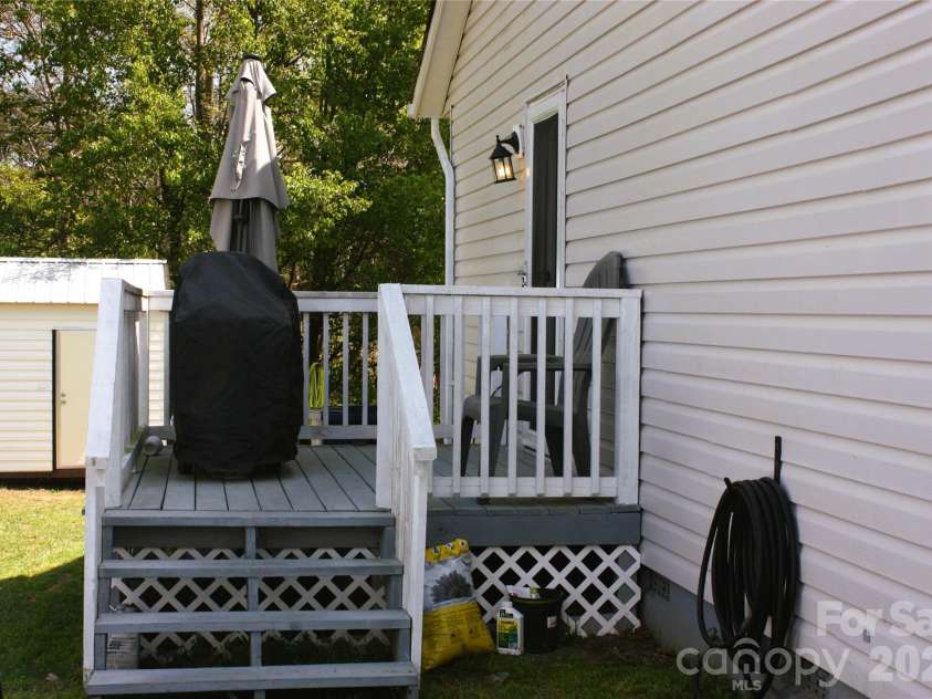 191 Celeste Eufola Road, Statesville, NC 28677.  MLS# CAR4365990, YatesRealty ID 11072. Side porch