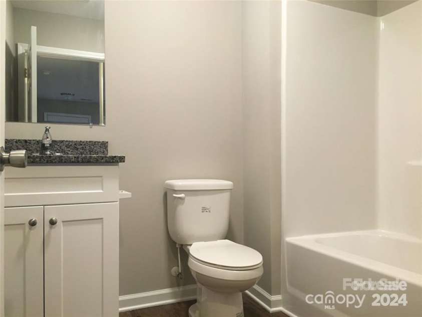 414 Wilkins Street, Dallas, NC 28034.  MLS# CAR4158663, YatesRealty ID 11075. 301 N Spargo bathroom