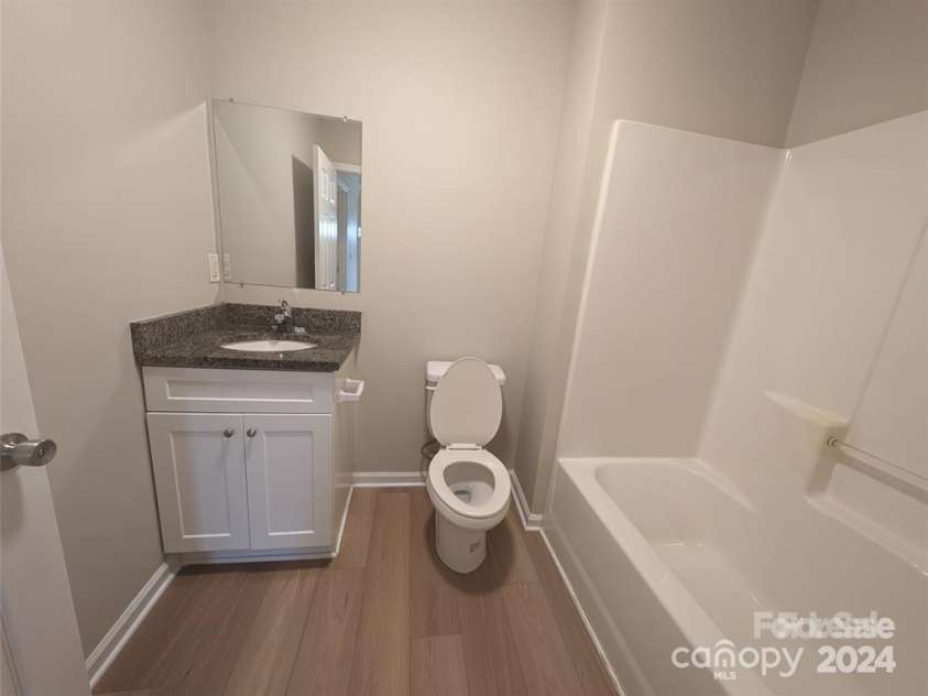 414 Wilkins Street, Dallas, NC 28034.  MLS# CAR4158663, YatesRealty ID 11075. 414 Wilkins bathroom