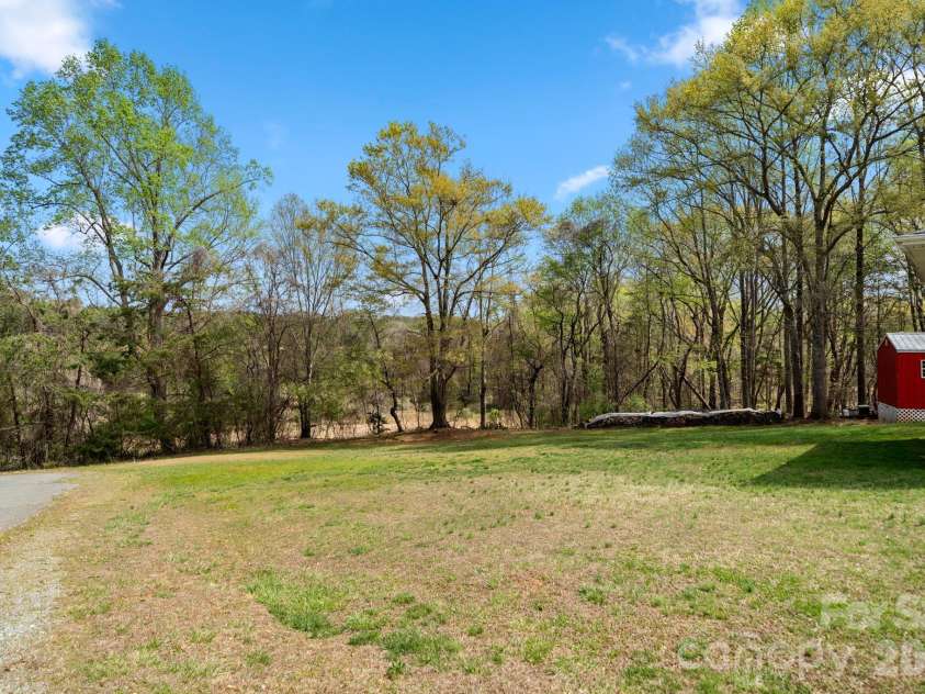 154 Shadowgate Drive, Forest City, NC 28043.  MLS# CAR4364664, YatesRealty ID 11076. Large and Virtually Level Side Yard