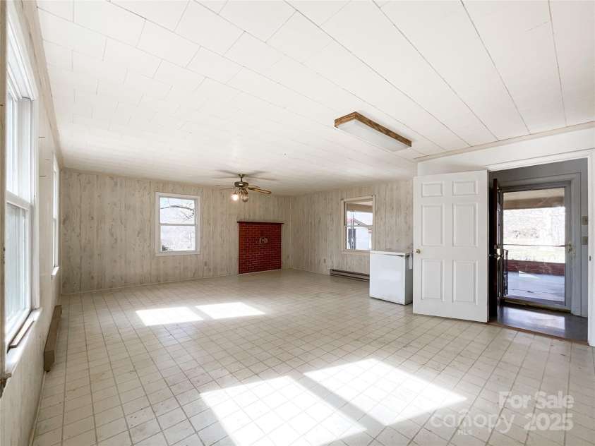 6523 Prospect Road, Monroe, NC 28112.  MLS# CAR4219856, YatesRealty ID 11076. Sunroom, located off entry hallway.