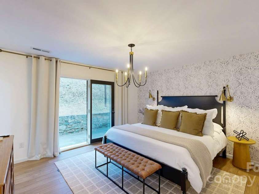 169 Chandler Road, Alexander, NC 28701.  MLS# CAR4226773, YatesRealty ID 11077. Master Ensuite open to patio