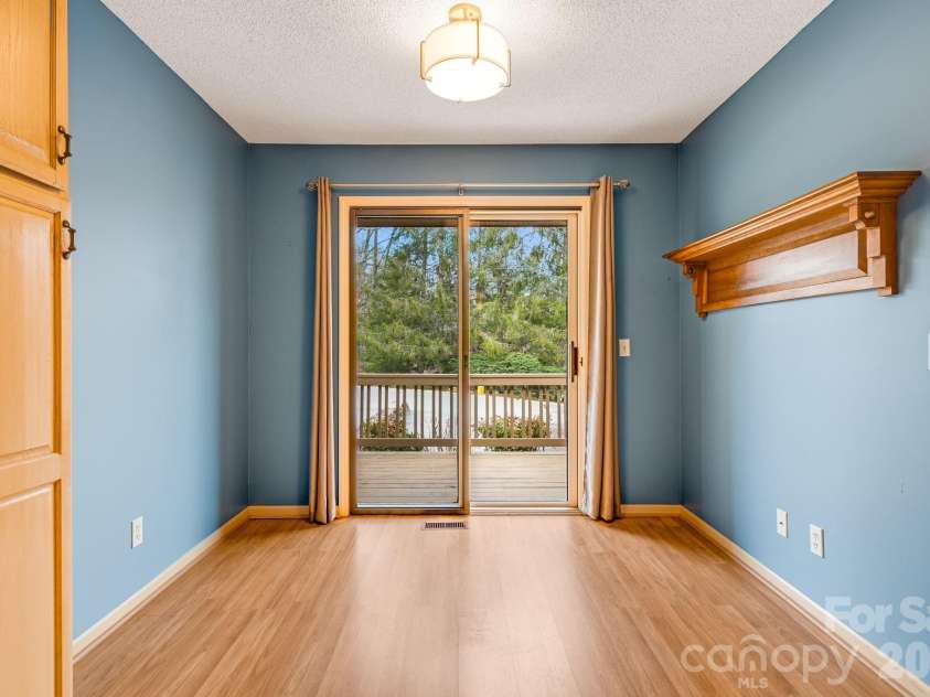 1104 Red Oak Drive, Hendersonville, NC 28791.  MLS# CAR4354614, YatesRealty ID 11078. Breakfast area overlooks front deck.
