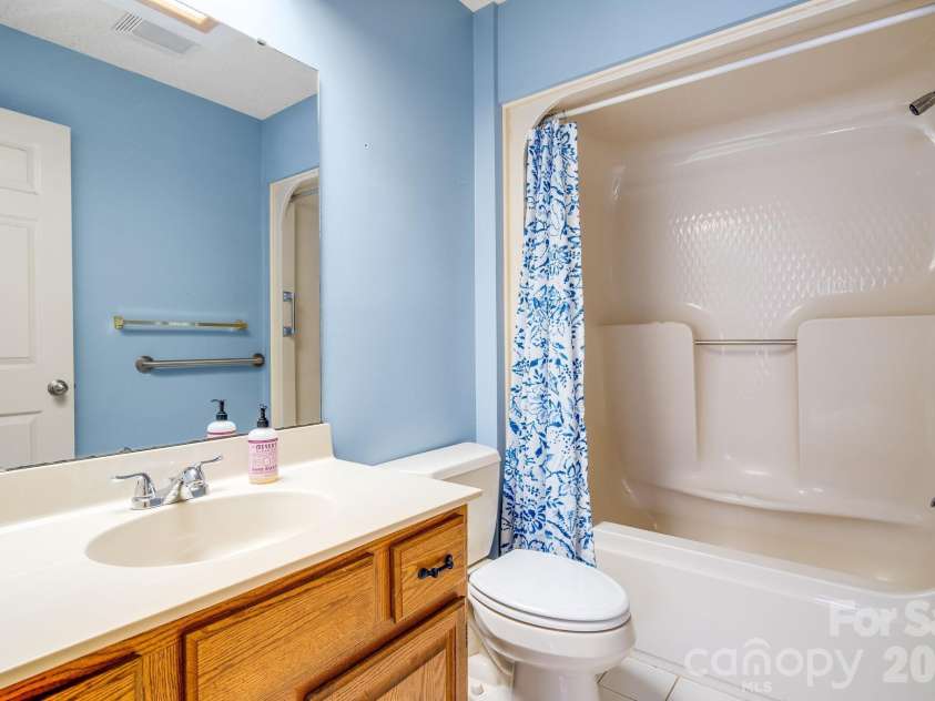 1104 Red Oak Drive, Hendersonville, NC 28791.  MLS# CAR4354614, YatesRealty ID 11078. Main level guest bath