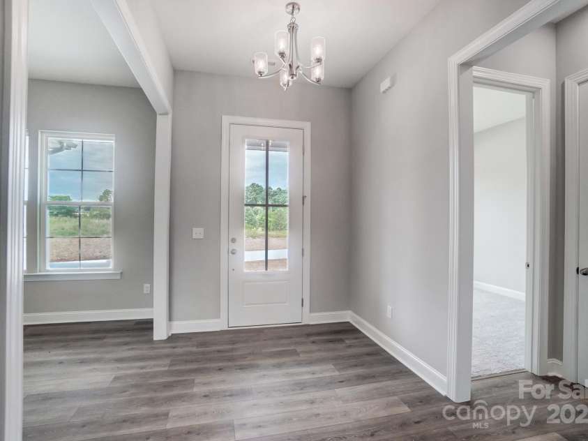 552 Fern Hill Road, Mooresville, NC 28117.  MLS# CAR4188879, YatesRealty ID 11078. Representative Photo-Foyer