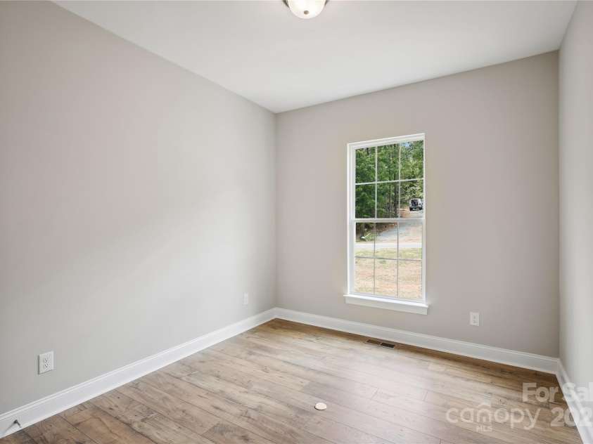 552 Fern Hill Road, Mooresville, NC 28117.  MLS# CAR4188879, YatesRealty ID 11078. Representative Photo-Guest Suite Down