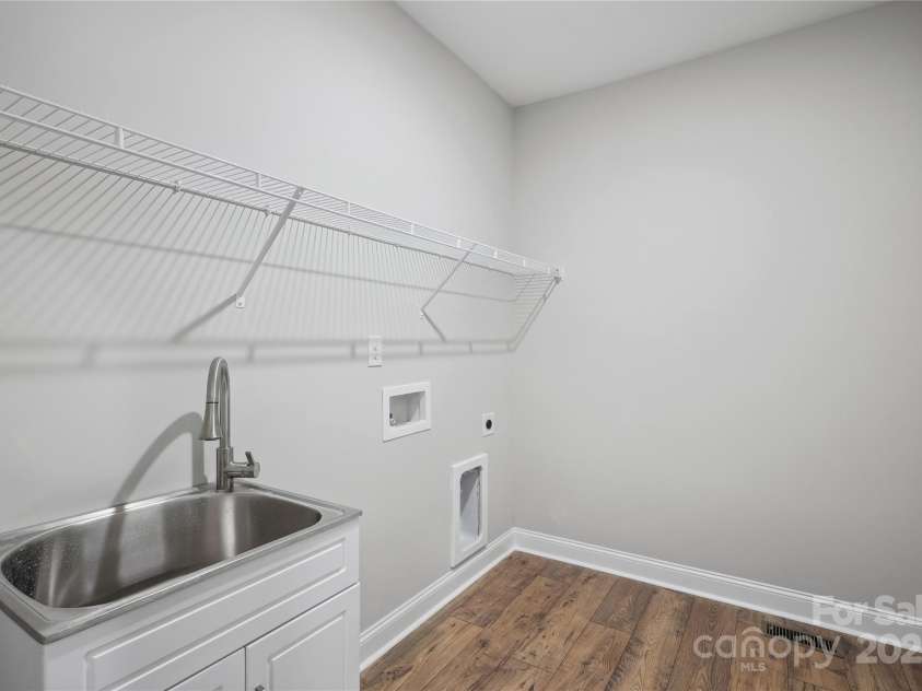 552 Fern Hill Road, Mooresville, NC 28117.  MLS# CAR4188879, YatesRealty ID 11078. Representative Photo-Laundry