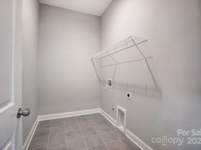 552 Fern Hill Road, Mooresville, NC 28117.  MLS# CAR4188879, YatesRealty ID 11078. Representative Photo-Laundry Room