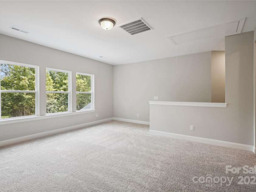 552 Fern Hill Road, Mooresville, NC 28117.  MLS# CAR4188879, YatesRealty ID 11078. Representative Photo-Loft