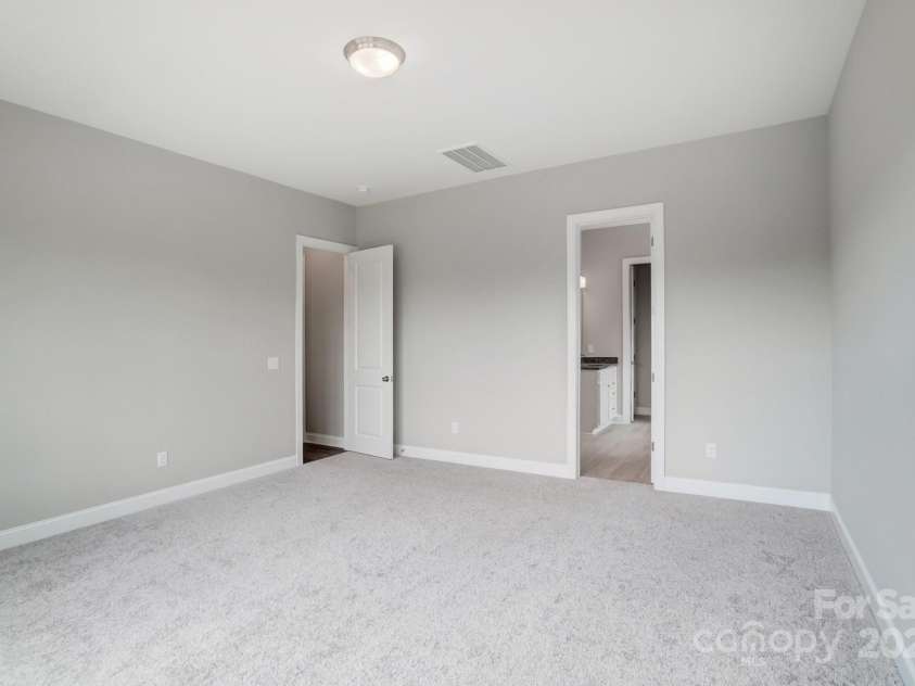 552 Fern Hill Road, Mooresville, NC 28117.  MLS# CAR4188879, YatesRealty ID 11078. Representative Photo-Secondary Bedroom