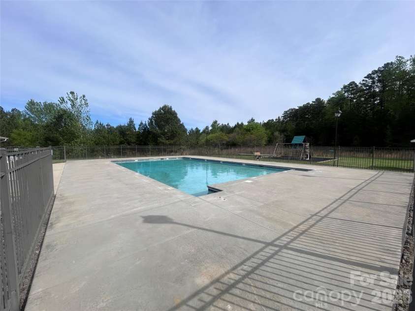 820 Sunset Pointe Drive, Salisbury, NC 28146.  MLS# CAR4363663, YatesRealty ID 11080. And Swimming Pool