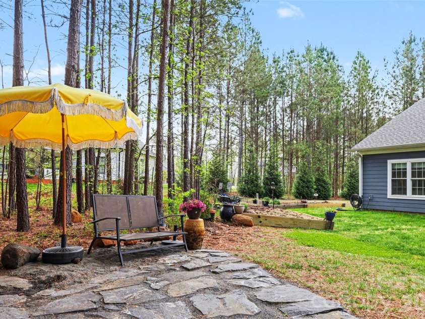 820 Sunset Pointe Drive, Salisbury, NC 28146.  MLS# CAR4363663, YatesRealty ID 11080. Four garden bed ready for your plants and vegetables!