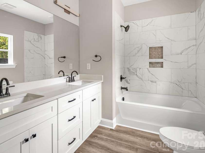 318 Stanback Street, Mount Gilead, NC 27306.  MLS# CAR4239118, YatesRealty ID 11090. Primary suite bathroom.
