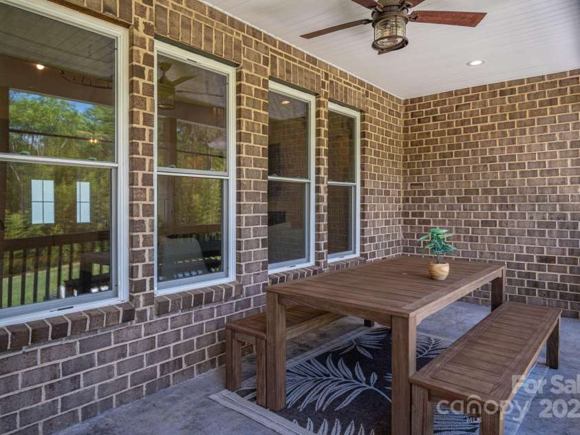 115 Woodward Way, Iron Station, NC 28080.  MLS# CAR4253712, YatesRealty ID 11092. Rear Covered Porch