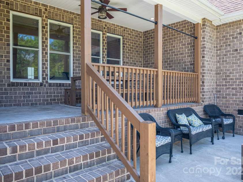 115 Woodward Way, Iron Station, NC 28080.  MLS# CAR4253712, YatesRealty ID 11092. Rear Covered Porchy