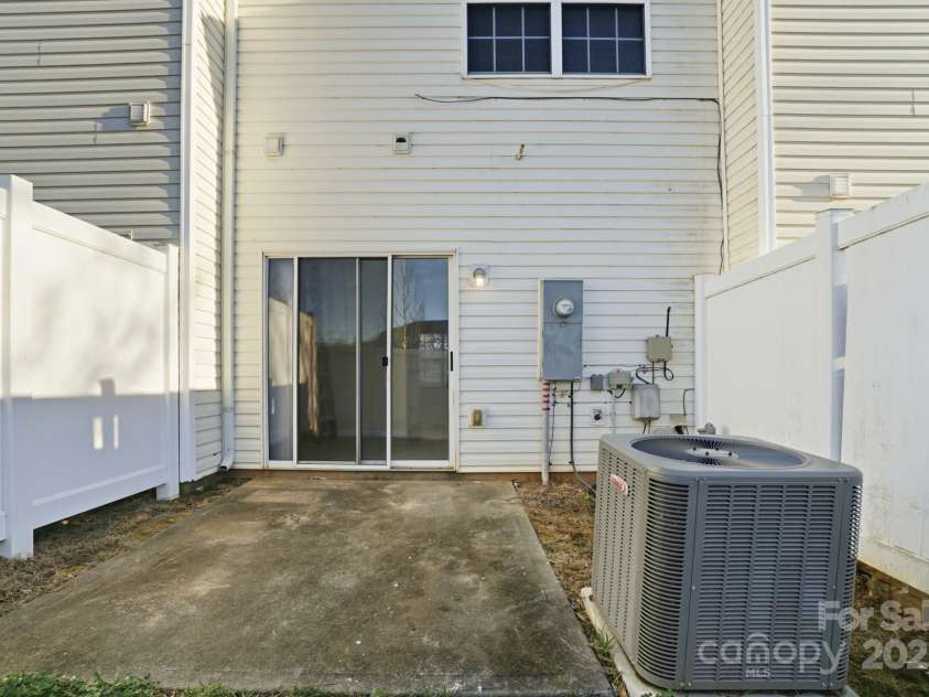 4944 Kotlik Drive, Charlotte, NC 28269.  MLS# CAR4326057, YatesRealty ID 11092. Back Patio