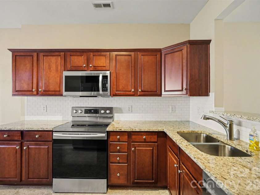3818 Carl Parmer Drive, Harrisburg, NC 28075.  MLS# CAR4358444, YatesRealty ID 11099. 