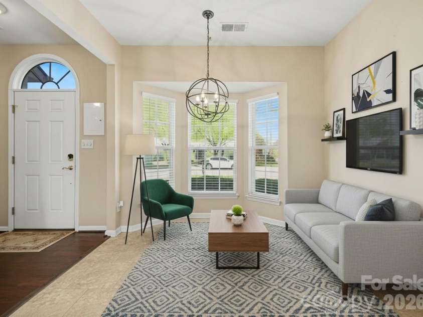 3818 Carl Parmer Drive, Harrisburg, NC 28075.  MLS# CAR4358444, YatesRealty ID 11099. Virtually Staged