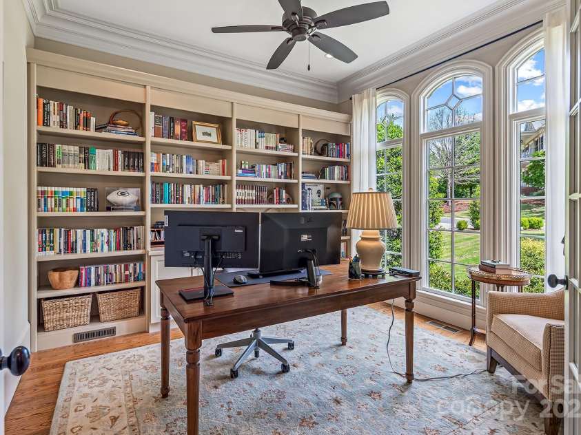 16824 Ashton Oaks Drive, Charlotte, NC 28278.  MLS# CAR4221737, YatesRealty ID 1110. First Floor office with French Doors and Built-in Bookcases