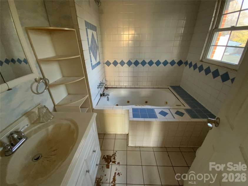 154 Lovelace Road, Forest City, NC 28043.  MLS# CAR4360348, YatesRealty ID 11101. Master Bathroom