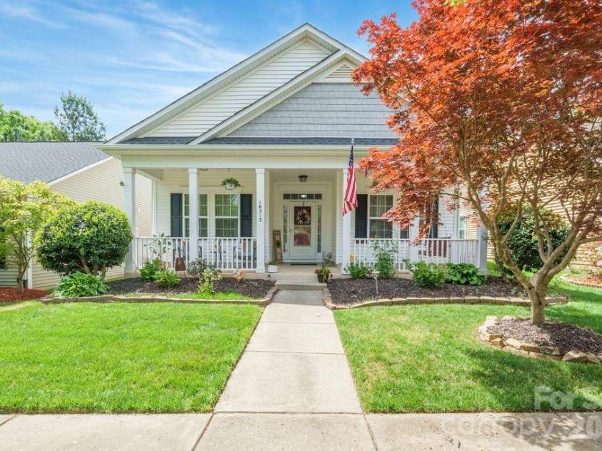 16515 Amberside Road, Cornelius, NC 28031.  MLS# CAR4366674, YatesRealty ID 11103. Detailed cedar shake accent and full porch
