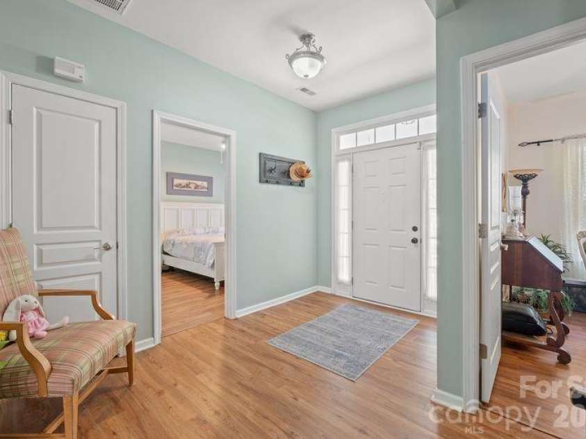 16515 Amberside Road, Cornelius, NC 28031.  MLS# CAR4366674, YatesRealty ID 11103. Front view toward front door with sidelights