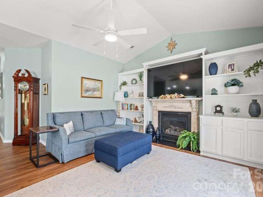16515 Amberside Road, Cornelius, NC 28031.  MLS# CAR4366674, YatesRealty ID 11103. Great room has built ins that flank the fireplace