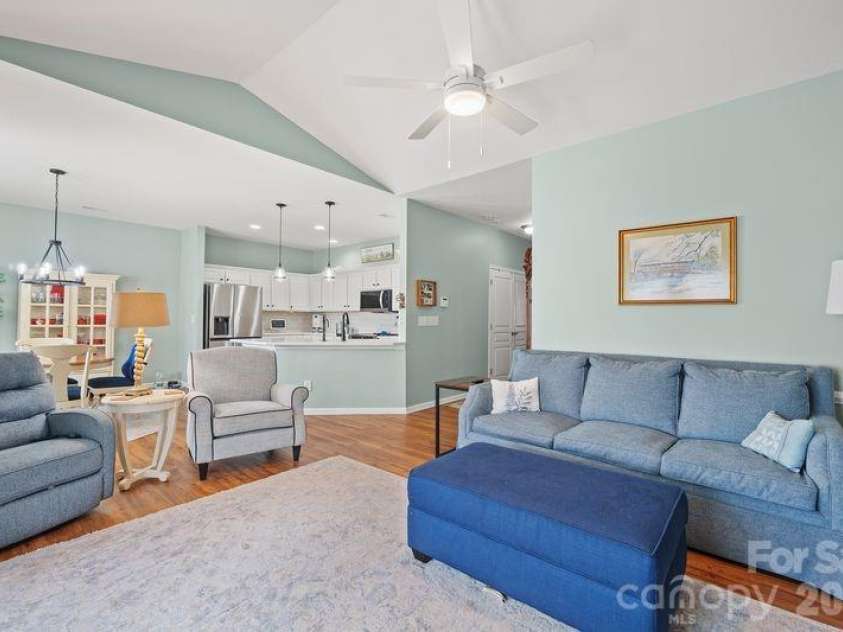 16515 Amberside Road, Cornelius, NC 28031.  MLS# CAR4366674, YatesRealty ID 11103. Great room toward the kitchen