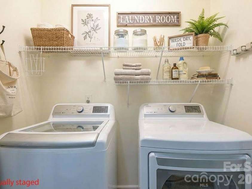 16515 Amberside Road, Cornelius, NC 28031.  MLS# CAR4366674, YatesRealty ID 11103. Hall accessed laundry space virtually staged shelves but shelves are included