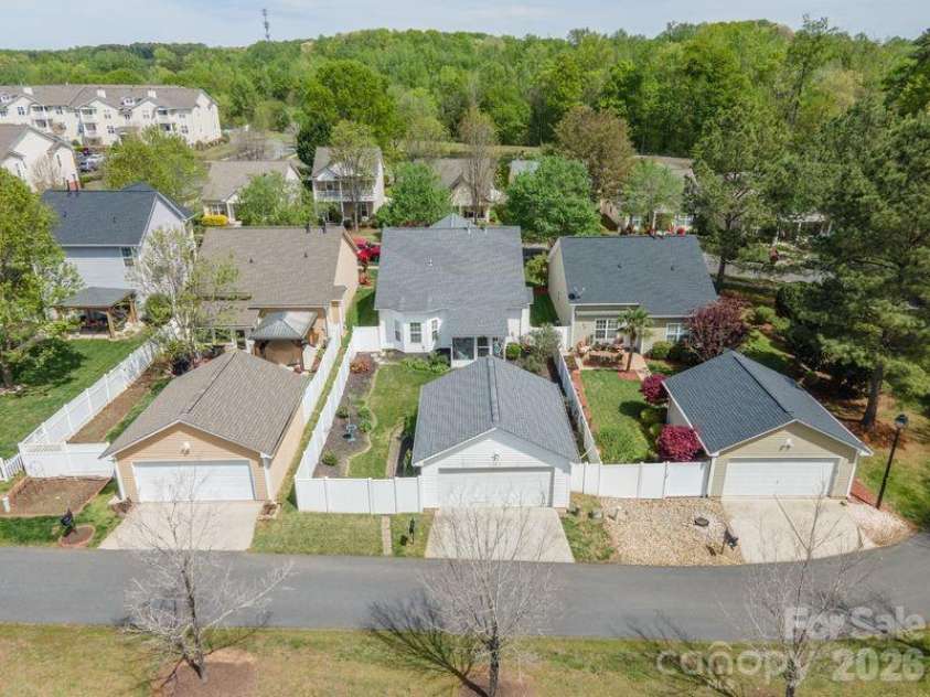 16515 Amberside Road, Cornelius, NC 28031.  MLS# CAR4366674, YatesRealty ID 11103. Overhead shot shows garage and fenced yard