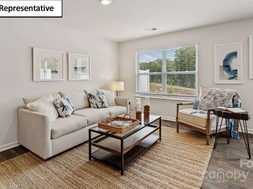 2917 Penninger Circle, Charlotte, NC 28262.  MLS# CAR4252226, YatesRealty ID 11104. Open concept family room and kitchen