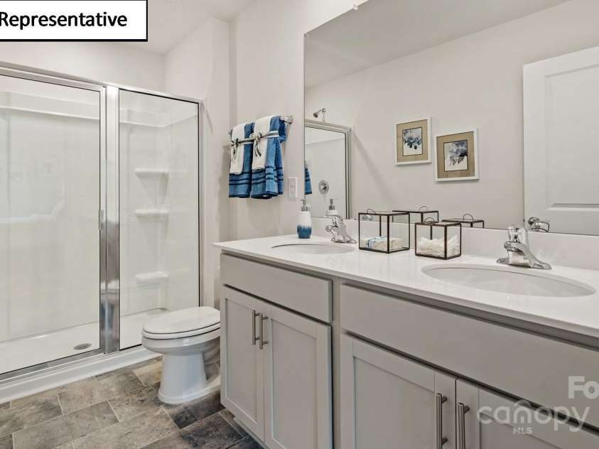 2917 Penninger Circle, Charlotte, NC 28262.  MLS# CAR4252226, YatesRealty ID 11104. Primary bathroom