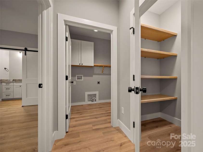 109 Ashley Court, Mill Spring, NC 28756.  MLS# CAR4255140, YatesRealty ID 11107. Laundry Room & Hall Closet