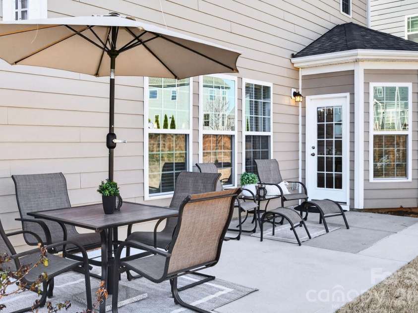 9635 Herringbone Lane, Concord, NC 28027.  MLS# CAR4354389, YatesRealty ID 11108. Extended Rear Patio 