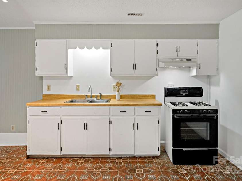 2526 Hankins Road, Marion, NC 28752.  MLS# CAR4270762, YatesRealty ID 1111. Lower Level Kitchen 