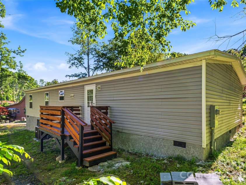 45 Alan Retreat Road, Hendersonville, NC 28792.  MLS# CAR4364735, YatesRealty ID 11110. Back of home