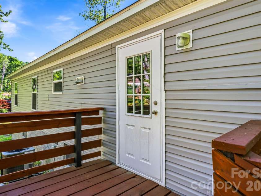 45 Alan Retreat Road, Hendersonville, NC 28792.  MLS# CAR4364735, YatesRealty ID 11110. Back porch
