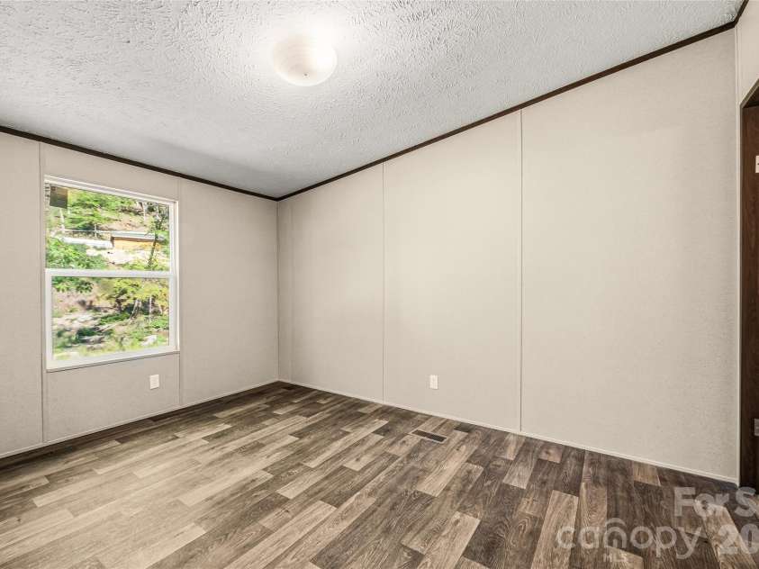 45 Alan Retreat Road, Hendersonville, NC 28792.  MLS# CAR4364735, YatesRealty ID 11110. Guest bedroom 2
