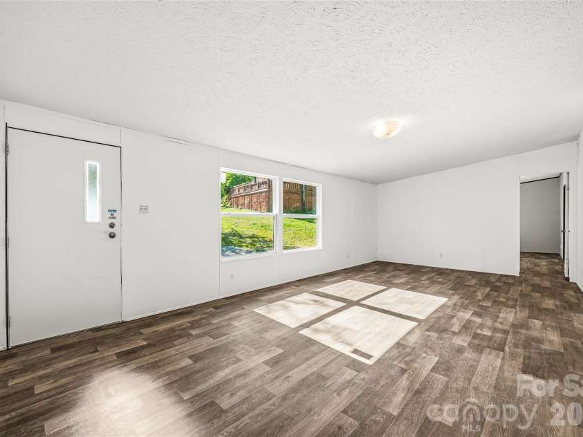 45 Alan Retreat Road, Hendersonville, NC 28792.  MLS# CAR4364735, YatesRealty ID 11110. Living room