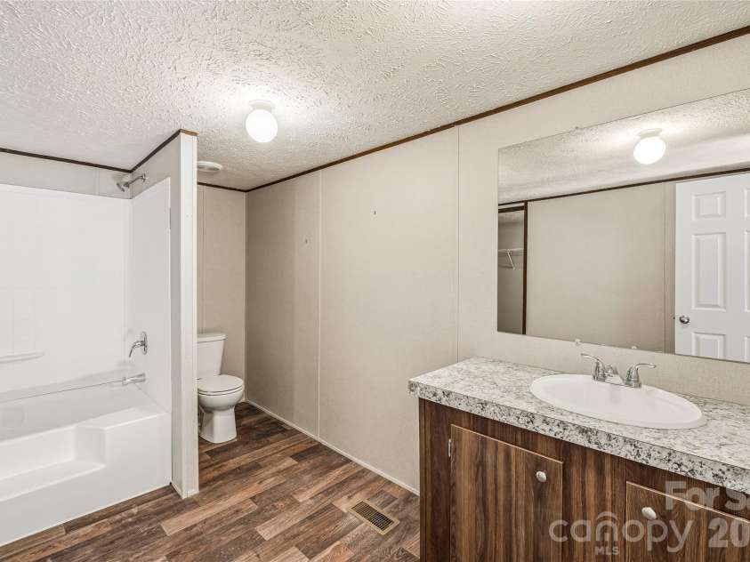 45 Alan Retreat Road, Hendersonville, NC 28792.  MLS# CAR4364735, YatesRealty ID 11110. Primary ensuite