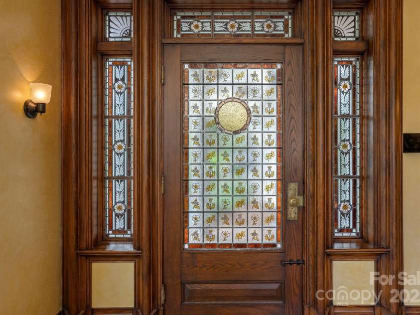 8 Fairway Place, Asheville, NC 28803.  MLS# CAR4245541, YatesRealty ID 11110. Leaded glass patterned after William Morris Arts and Crafts era artwork.