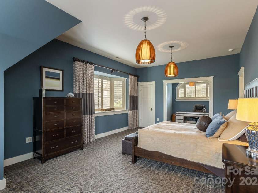 8 Fairway Place, Asheville, NC 28803.  MLS# CAR4245541, YatesRealty ID 11110. Two spacious bedrooms, each with en-suite bathrooms and walk-in closets.