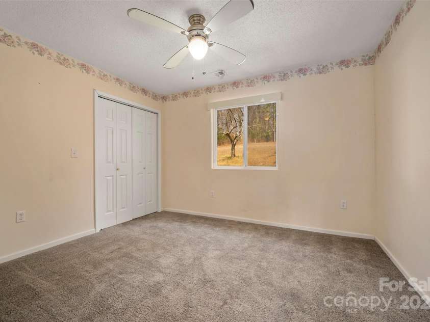 163 Woodland Drive, Columbus, NC 28722.  MLS# CAR4240701, YatesRealty ID 11111. Guest bedroom #2 with walk-in closet