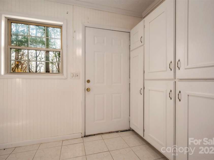 163 Woodland Drive, Columbus, NC 28722.  MLS# CAR4240701, YatesRealty ID 11111. Kitchen with plenty of storage options